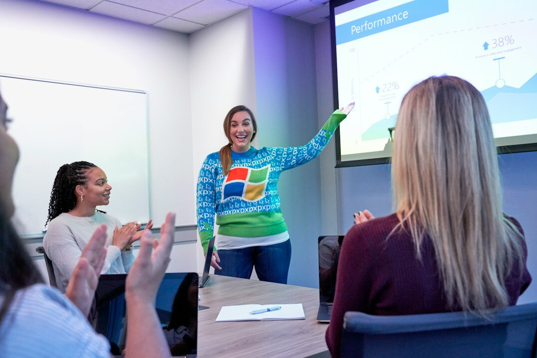 woman presenting to audience