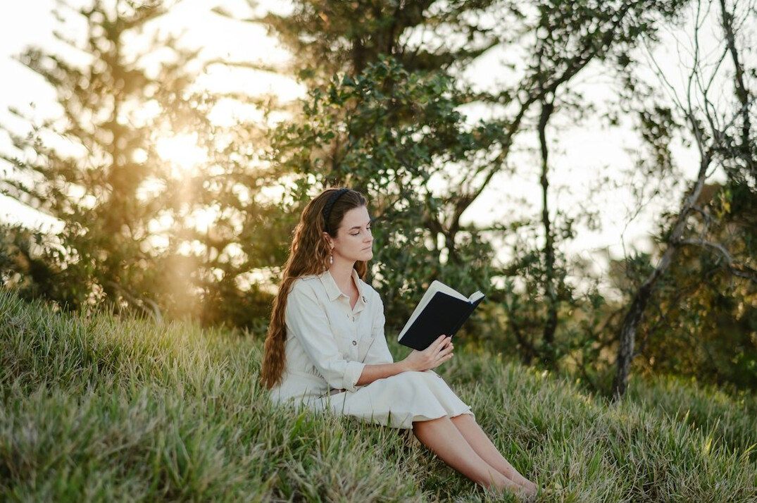woman journaling in nature